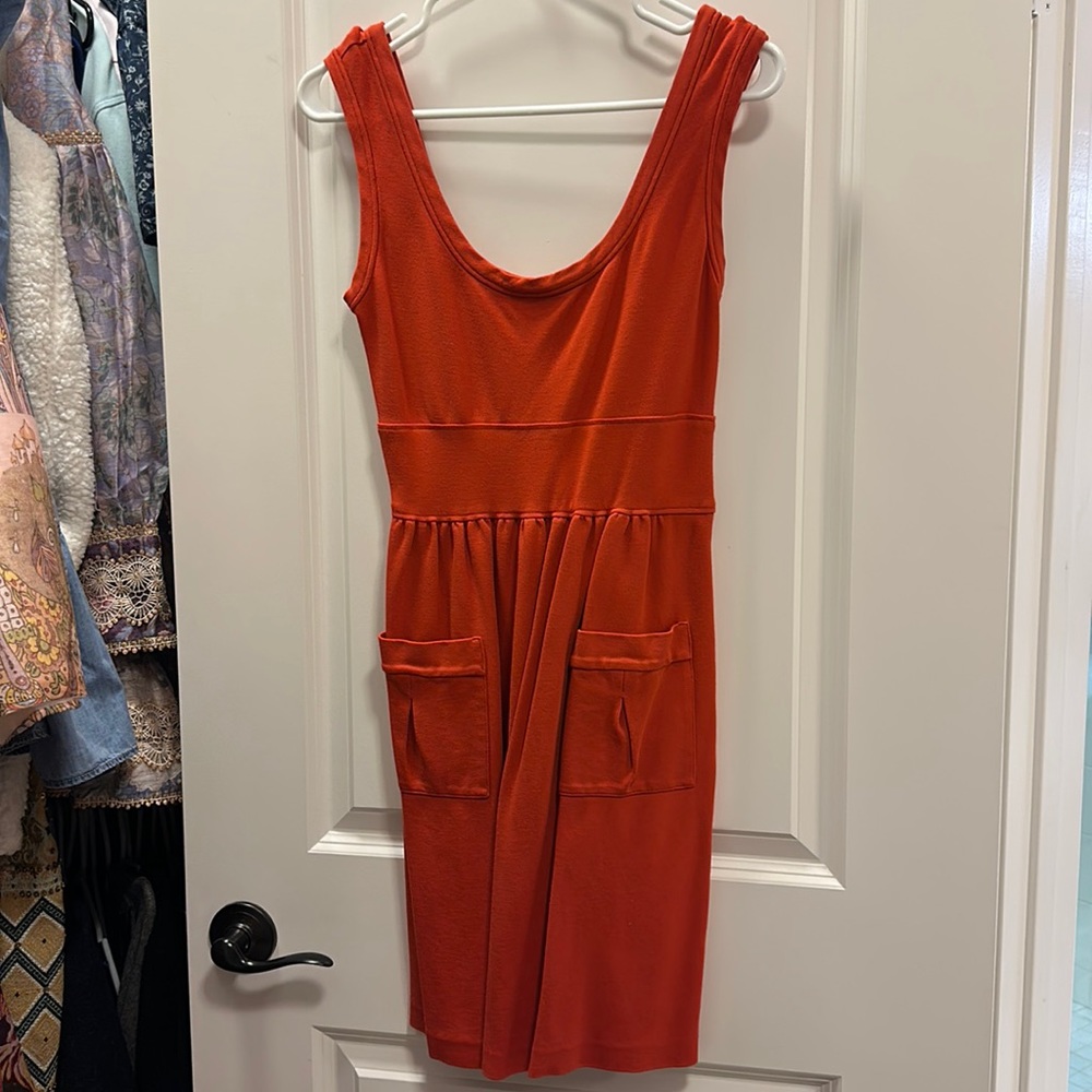 Used and loved orange dress